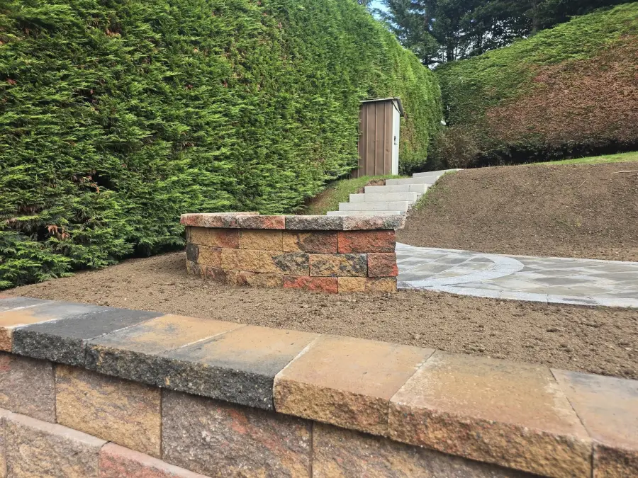 Stone wall with curved path by Perfect Paving Belfast